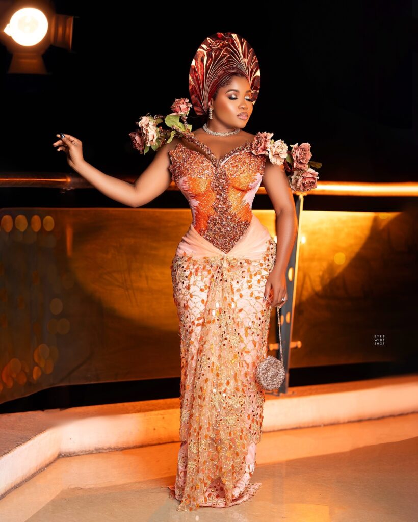 Lace dress with petal beading details by Amy Aghomi on Veekee James.
