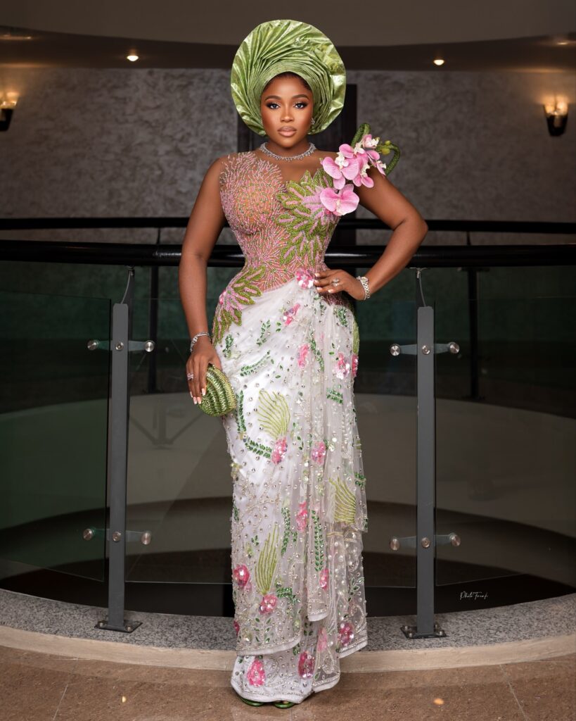 Veekee James in a pink and lemon Asoebi-inspired gown by Bella by Airla Hills.